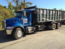 thrifty roll off dumpster truck